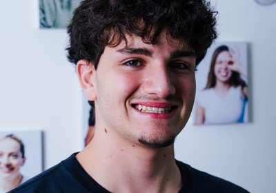 dr saba orthodontist in abu dhabi a young man with confident smile