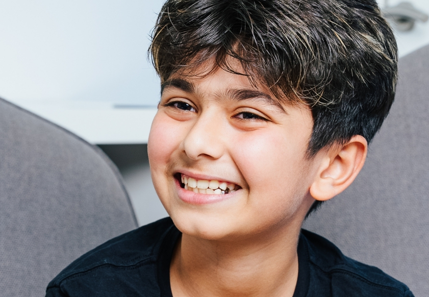 Young child at an orthodontic check-up while the clinician examines tooth development